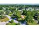 A charming neighborhood is surrounded by beautiful lush trees, which creates a welcoming and peaceful atmosphere at 3831 Se 48Th St, Ocala, FL 34480