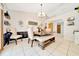 Bright dining area featuring a modern table with bench seating and a chalkboard wall at 3831 Se 48Th St, Ocala, FL 34480