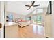 Spacious main bedroom with hardwood floors, ceiling fan and natural light at 3831 Se 48Th St, Ocala, FL 34480