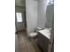 Bathroom featuring a vanity with sink, toilet, and a shower and tub combo at 3858 Sw 161St St, Ocala, FL 34473