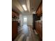 Kitchen featuring wooden cabinets and stainless steel appliances at 3858 Sw 161St St, Ocala, FL 34473