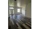 Spacious living room with hardwood floors and natural light at 3858 Sw 161St St, Ocala, FL 34473