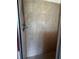 Tiled shower featuring decorative inlays and an adjustable shower head at 3858 Sw 161St St, Ocala, FL 34473