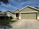 Charming single-story home featuring a two-car garage and well-manicured lawn in a tranquil neighborhood at 3950 Sw 54Th Ct, Ocala, FL 34474