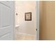 Half bathroom featuring a pedestal sink, tile floors and neutral walls at 4094 Sw 51St Ct, Ocala, FL 34474