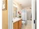 Bright bathroom with a shower-tub combination and vanity at 4094 Sw 51St Ct, Ocala, FL 34474