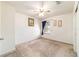 Bedroom with carpet, ceiling fan, window, and art on the wall at 4094 Sw 51St Ct, Ocala, FL 34474