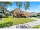 Two-story home with well-maintained landscaping and two-car garage at 4094 Sw 51St Ct, Ocala, FL 34474
