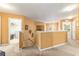 Upstairs hallway with laundry room and views of downstairs at 4094 Sw 51St Ct, Ocala, FL 34474
