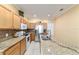 Bright kitchen featuring granite countertops, tile backsplash, stainless steel appliances and ample cabinet space at 4094 Sw 51St Ct, Ocala, FL 34474