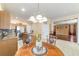 Bright kitchen with stainless steel appliances and a doorway leading to the living room at 4094 Sw 51St Ct, Ocala, FL 34474