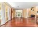 Spacious open living room with hardwood flooring and bright natural lighting at 4094 Sw 51St Ct, Ocala, FL 34474