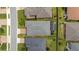 Aerial view of the home's backyard, showcasing a private pool, well-maintained lawn, and fenced perimeter at 4340 Nw 56Th Ct, Ocala, FL 34482