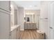 Spacious bathroom features dual vanities with granite countertops and a large glass shower at 4340 Nw 56Th Ct, Ocala, FL 34482