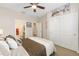 Spacious bedroom with neutral tones, closet, and an ensuite bathroom at 4340 Nw 56Th Ct, Ocala, FL 34482