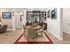 Cozy dining area features a round table, stylish chairs, and a built-in display cabinet with unique decor at 4340 Nw 56Th Ct, Ocala, FL 34482