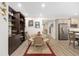 Dining area with a round table, seating for four, and a built-in shelving unit for decor at 4340 Nw 56Th Ct, Ocala, FL 34482