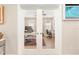 Home office with glass French doors, tile flooring, and ample workspace for productivity at 4340 Nw 56Th Ct, Ocala, FL 34482
