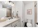 Clean, well-lit bathroom with a modern vanity and shower at 4416 Homan Loop, The Villages, FL 32163