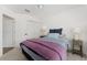 Bedroom with a neutral color scheme, ceiling fan, and a bright window at 4416 Homan Loop, The Villages, FL 32163