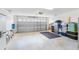 A spacious two car garage provides ample space for parking and storage at 4416 Homan Loop, The Villages, FL 32163