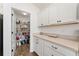 Spacious pantry with shelving and storage space at 4416 Homan Loop, The Villages, FL 32163