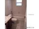 Full bathroom with a single sink vanity, toilet, and tub/shower combination at 4420 Sw 100Th St, Ocala, FL 34476