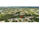 Expansive aerial shot showcases neighborhood homes surrounded by lush greenery and mature trees at 4501 Sw 159Th Street Rd, Ocala, FL 34473