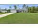 Charming one-story home with a well-manicured lawn and a two car garage at 4501 Sw 159Th Street Rd, Ocala, FL 34473