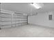 Spacious garage with a roll up garage door at 4501 Sw 159Th Street Rd, Ocala, FL 34473