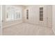 Spacious bedroom with carpeted floors and large built-in cabinetry at 5093 Nw 35Th Lane Rd, Ocala, FL 34482