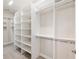 Large walk-in closet with multiple levels of shelving and hanging racks at 5093 Nw 35Th Lane Rd, Ocala, FL 34482