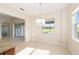 Bright dining area with patio access and stylish hanging light fixture at 5093 Nw 35Th Lane Rd, Ocala, FL 34482