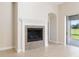 Close up on the fireplace, featuring granite tile surround at 5093 Nw 35Th Lane Rd, Ocala, FL 34482