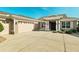 Home with a three-car garage and an extra-long concrete driveway at 5093 Nw 35Th Lane Rd, Ocala, FL 34482