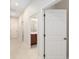 Long hallway with a view to the bathroom at 5093 Nw 35Th Lane Rd, Ocala, FL 34482