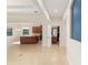 Open-concept interior view showcasing the living room, kitchen, and half bathroom at 5093 Nw 35Th Lane Rd, Ocala, FL 34482