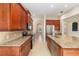 Kitchen with granite counters, stainless steel appliances, and wood cabinets at 5093 Nw 35Th Lane Rd, Ocala, FL 34482