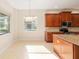 Eat-in kitchen with stainless steel appliances and large window at 5093 Nw 35Th Lane Rd, Ocala, FL 34482