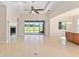 A large living room offers an open space concept with a fireplace and tile flooring at 5093 Nw 35Th Lane Rd, Ocala, FL 34482