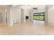 Spacious living room featuring a cozy fireplace and sliding glass doors at 5093 Nw 35Th Lane Rd, Ocala, FL 34482