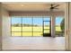 Spacious screened patio with ceiling fan and a great view at 5093 Nw 35Th Lane Rd, Ocala, FL 34482