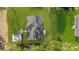 An aerial view of a house with a well maintained lawn and landscaping at 5400 Nw 9Th St, Ocala, FL 34482