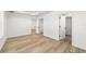 Bedroom with a large window, showcasing the open layout leading to the walk-in closet at 5400 Nw 9Th St, Ocala, FL 34482