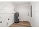 Utility room featuring a water heater and storage shelving at 5400 Nw 9Th St, Ocala, FL 34482