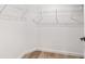 Walk-in closet featuring wire shelving and wood-look flooring at 5400 Nw 9Th St, Ocala, FL 34482