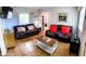 Cozy living room with tile flooring, comfortable seating, and natural light at 626 Ne 21St St, Ocala, FL 34470