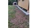 Exterior shot of a home with ground draining at 6415 Ne 23Rd Ave, Ocala, FL 34479