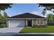 Charming single-story home boasts a well-manicured lawn, attached two-car garage, and stylish front entry at 6865 Sw 153 Place Rd, Ocala, FL 34473