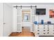 En-suite bathroom with sliding door entrance at 7242 Sw 115Th Pl, Ocala, FL 34476